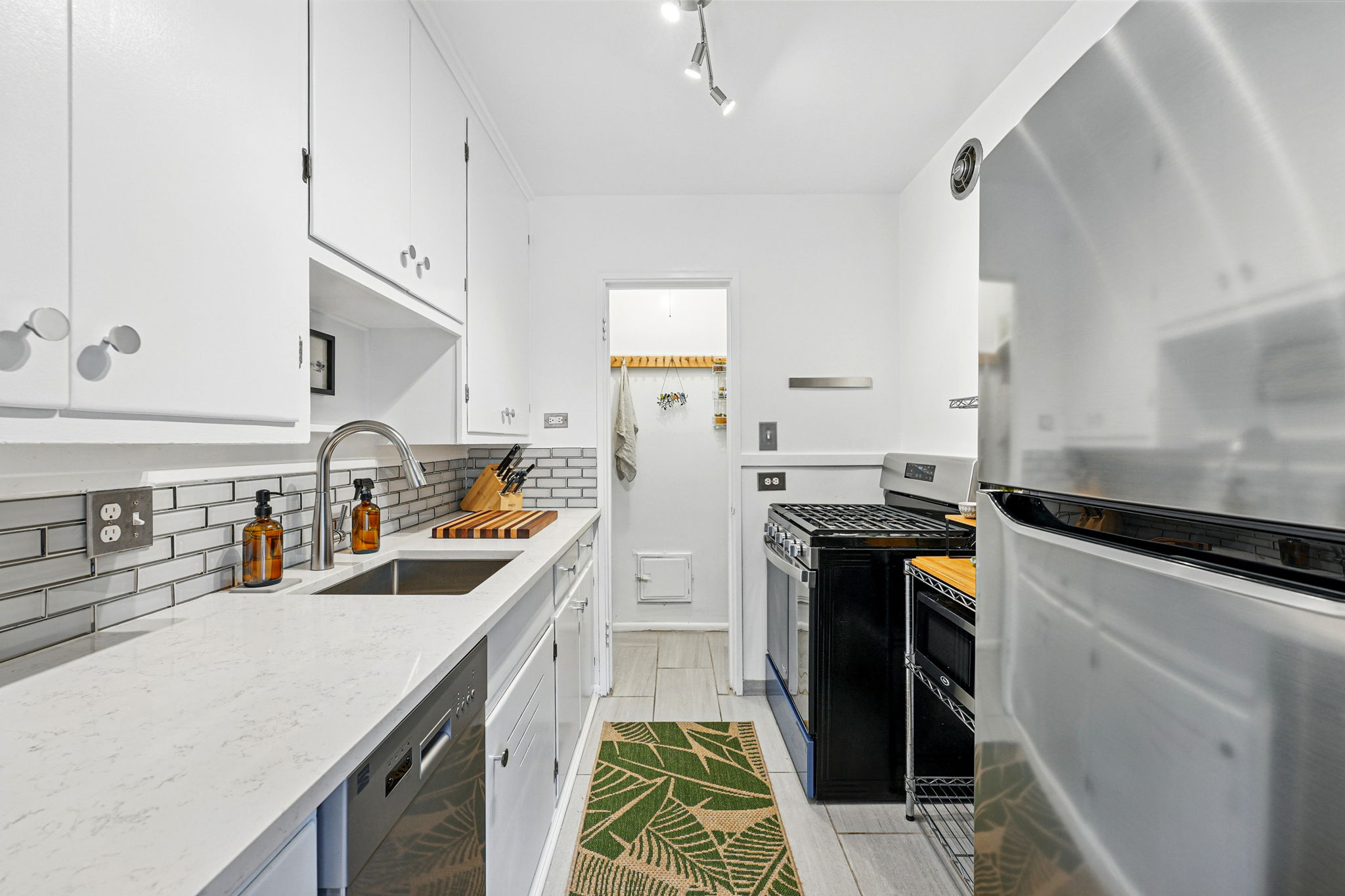Updated kitchen features a newer dishwasher and pantry!