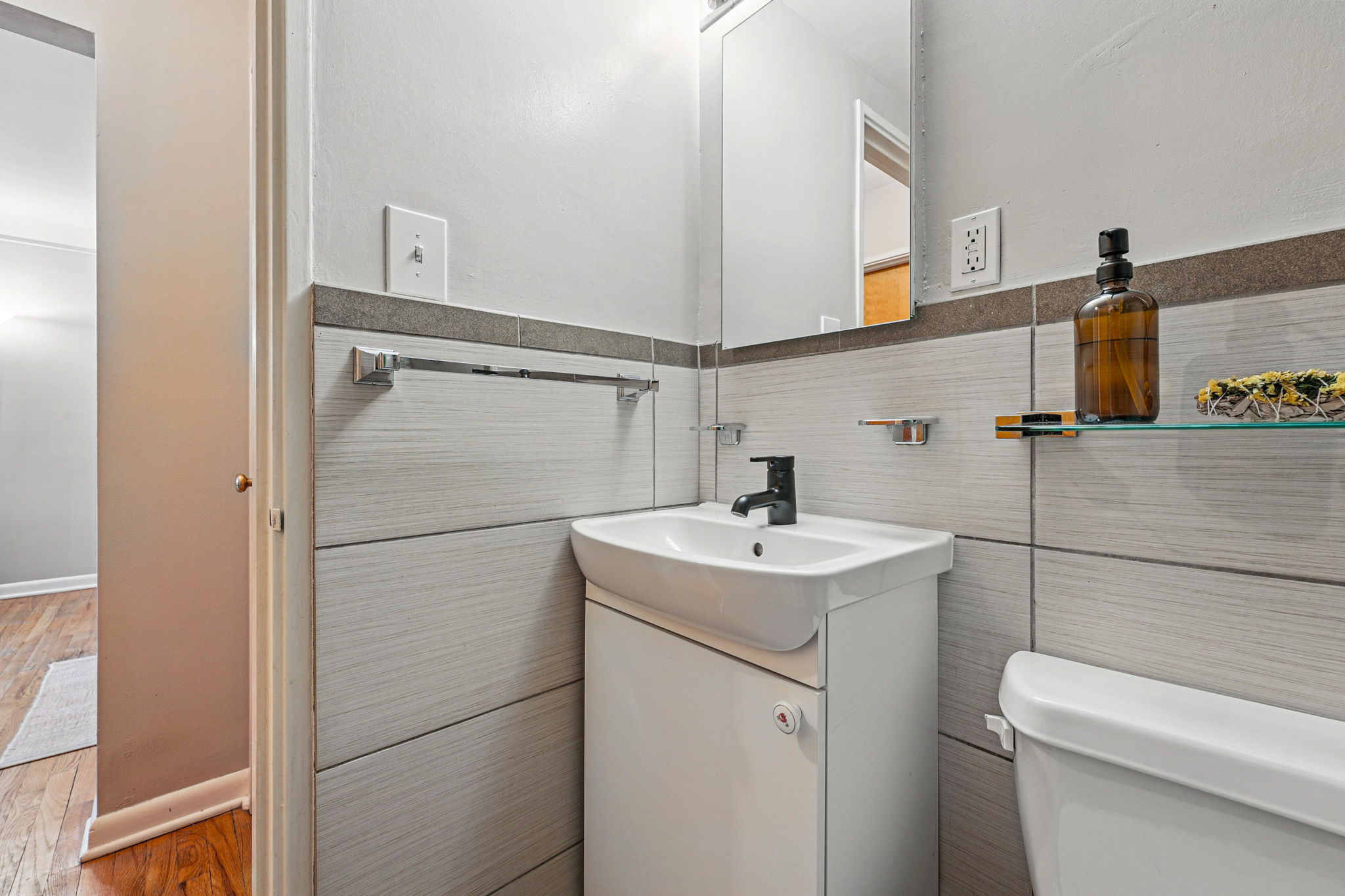 Updated vanity and tile in the bathroom.