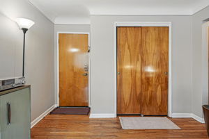 Large coat closet offers plenty of storage.