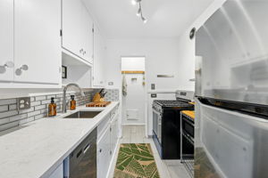 Updated kitchen features a newer dishwasher and pantry!