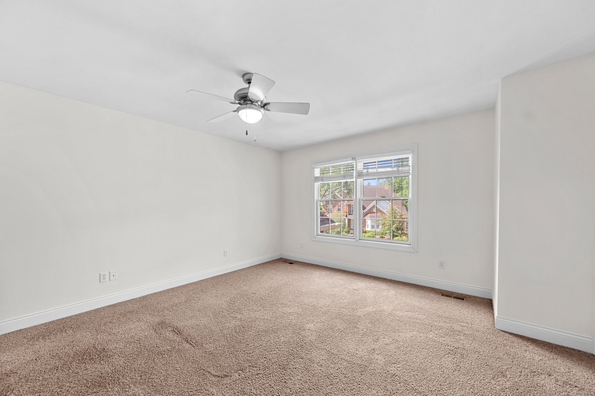 Heading upstairs, there are 3 very large bedrooms. Each has a walk-in closet and access to a bathroom.