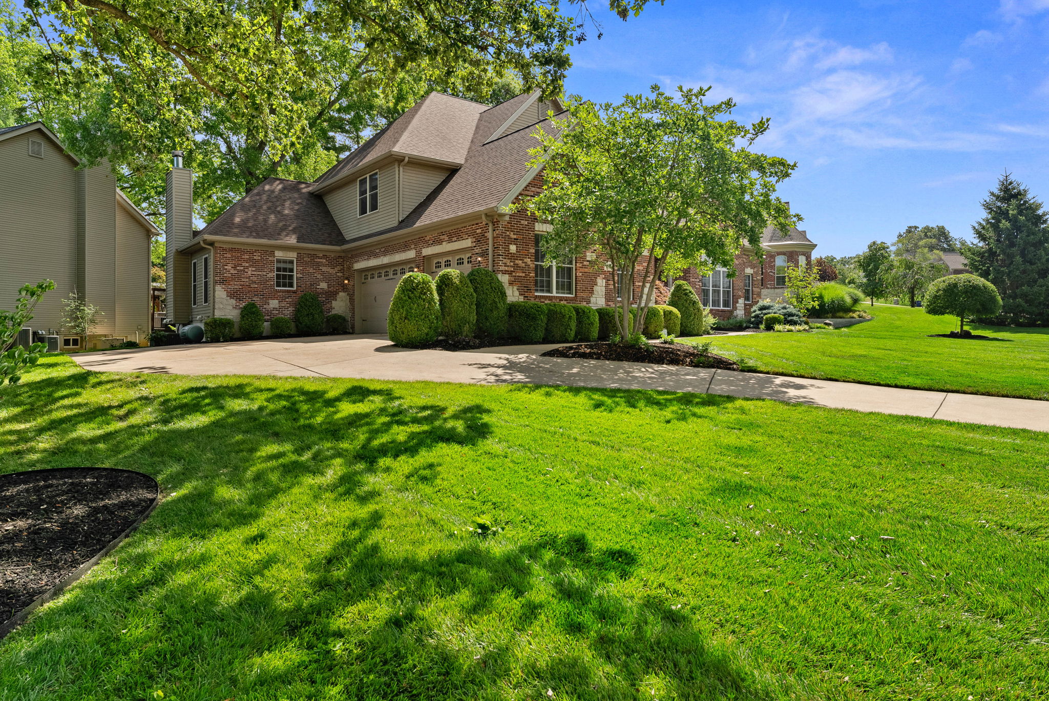 This impressive home boasts well over 6000 sqft of finished living space, on a professionally landscaped .5 acre lot, in the award-winning Kirkwood school district.