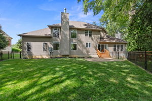 What makes this house truly special is the picturesque pie-shaped lot.