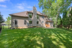 The backyard is fully-fenced, ideal for furry friends and playsets.