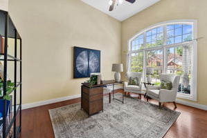 The main floor bonus room is the ideal home office with a lovely view and french doors for privacy.