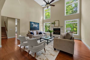 The formal living room has the most gorgeous soaring ceilings and natural light.