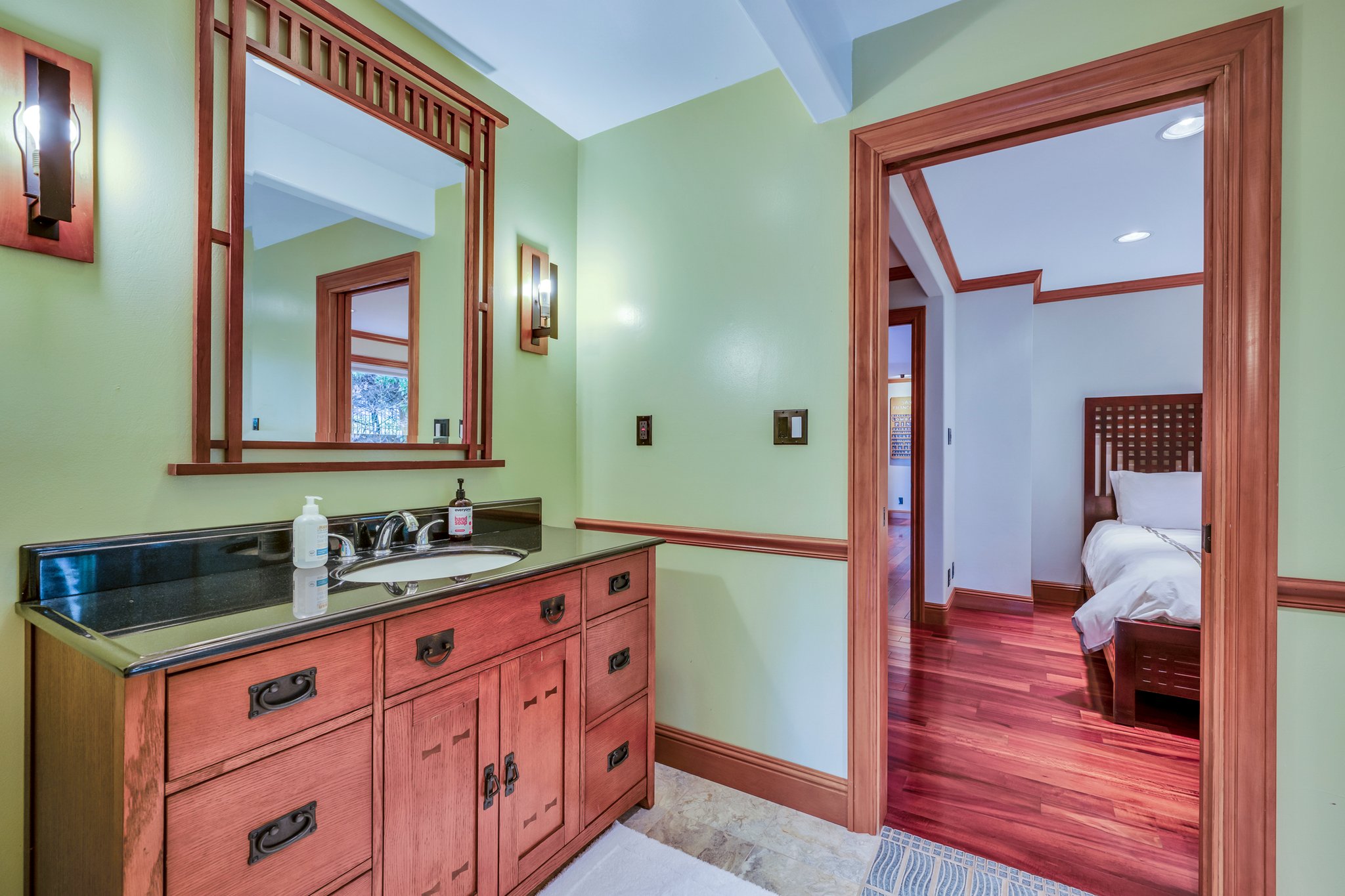 Full guest bath joins the family room and guest room