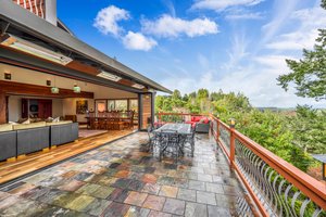 Open to the outdoor decks with views of the Maycamas