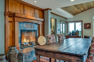 Gas fireplace in kitchen dining area