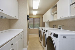Laundry Center with NEW Dual Washers/Dryers