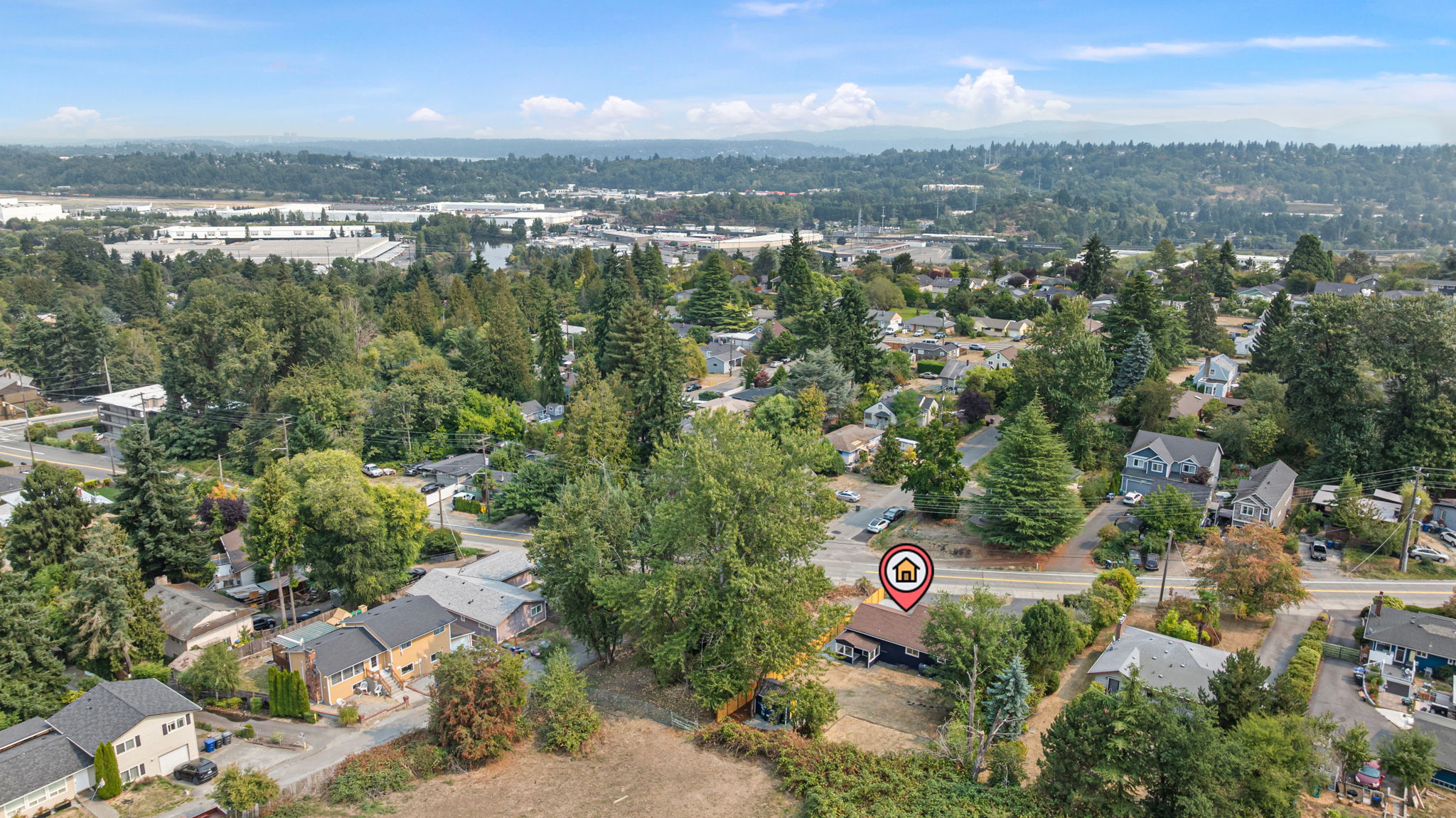 From this angle, you can see how the home backs to open land while remaining just minutes from grocery stores, schools, and quick freeway access.