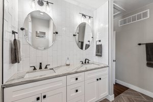 Expanded and Remodeled Master Bathroom with Dual Sinks