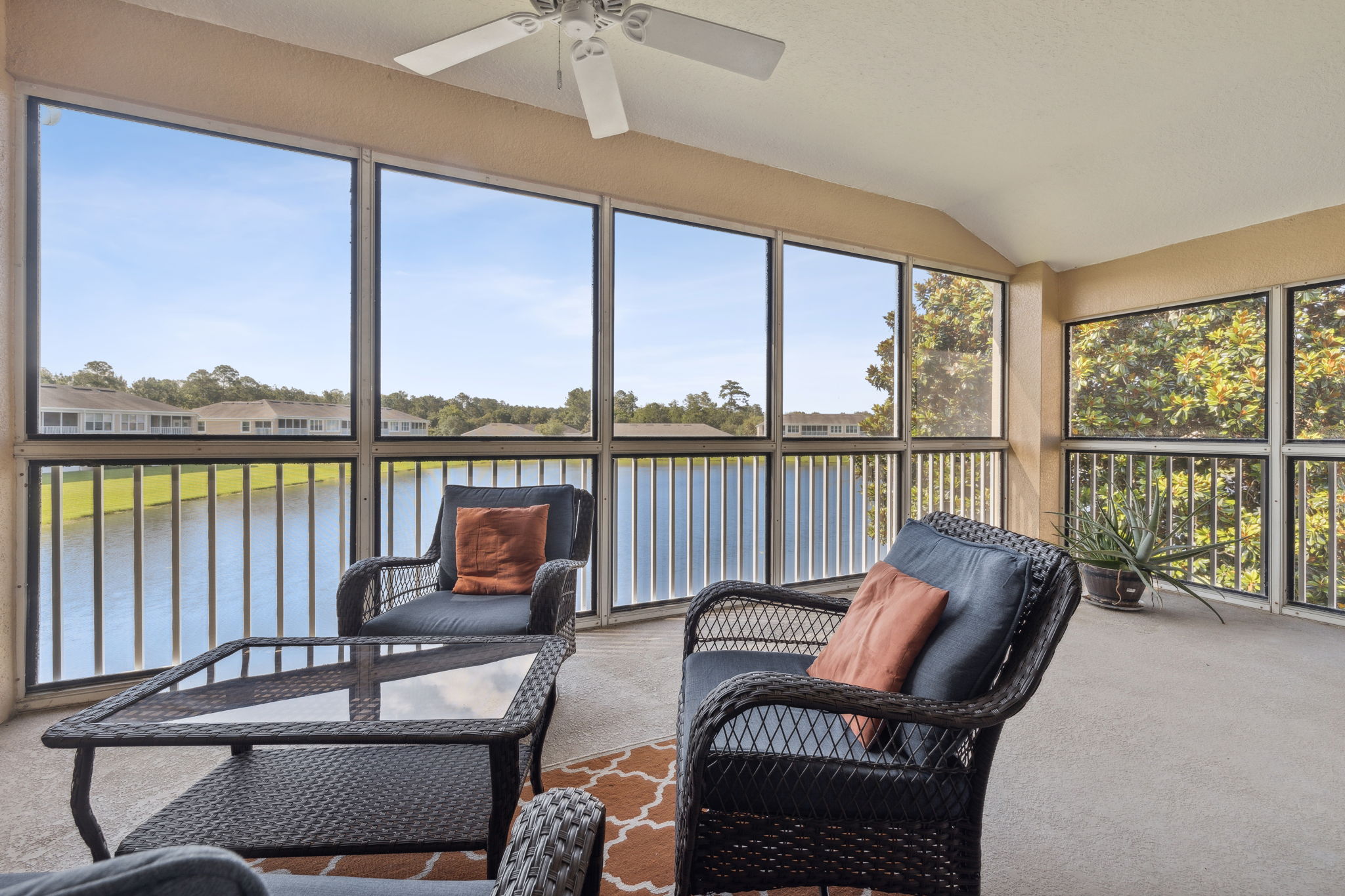 Screened Lanai with Expansive Pond View