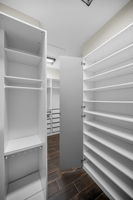 Primary Bedroom Walk-in Closet1f