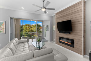 Bright living room with expansive windows and serene views