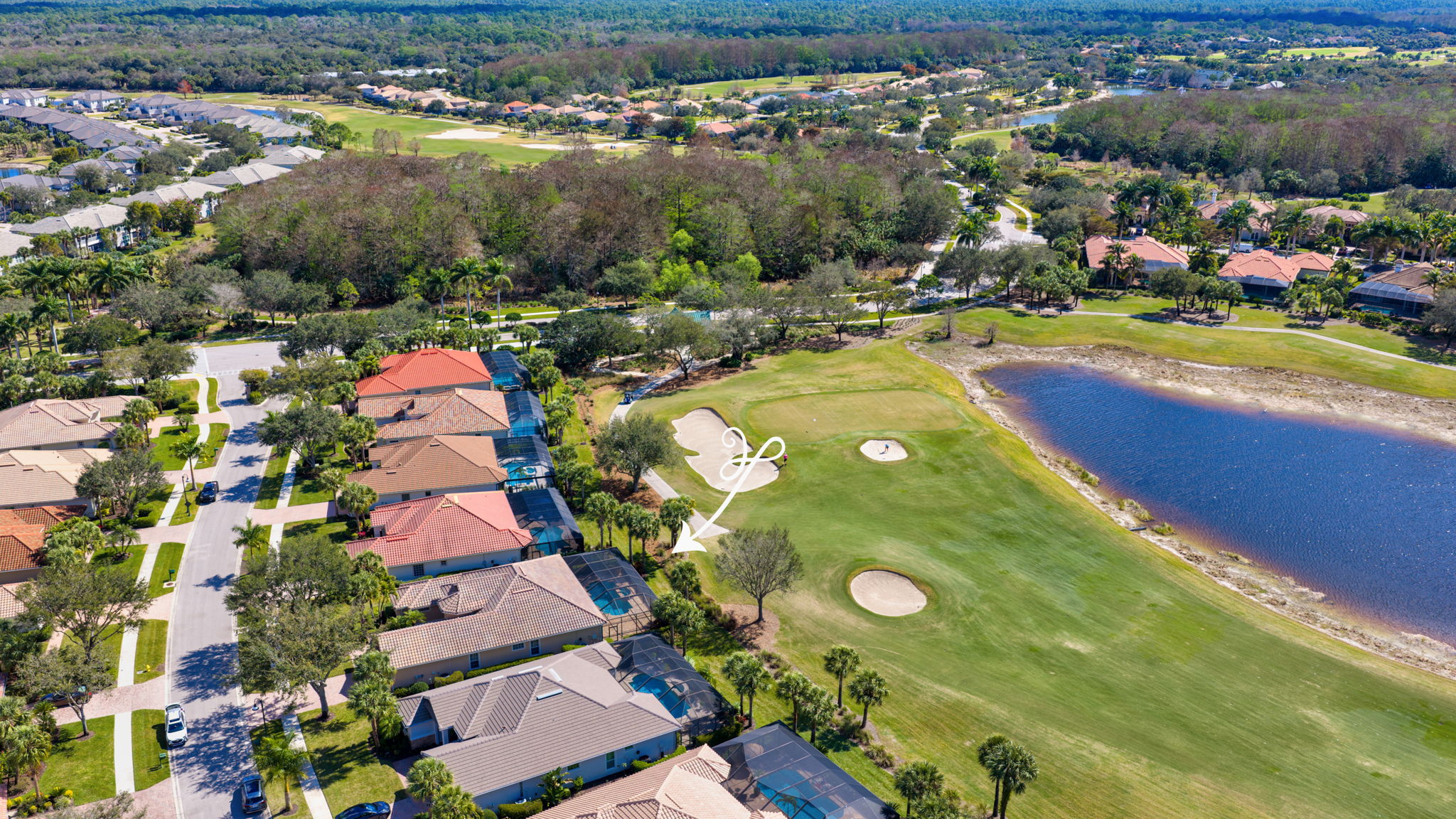 Aerial View-Showcasing Golf Course and Lake