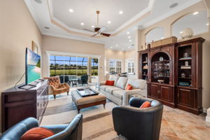 Living Room Looking Through Glass Sliding Doors to Lanai