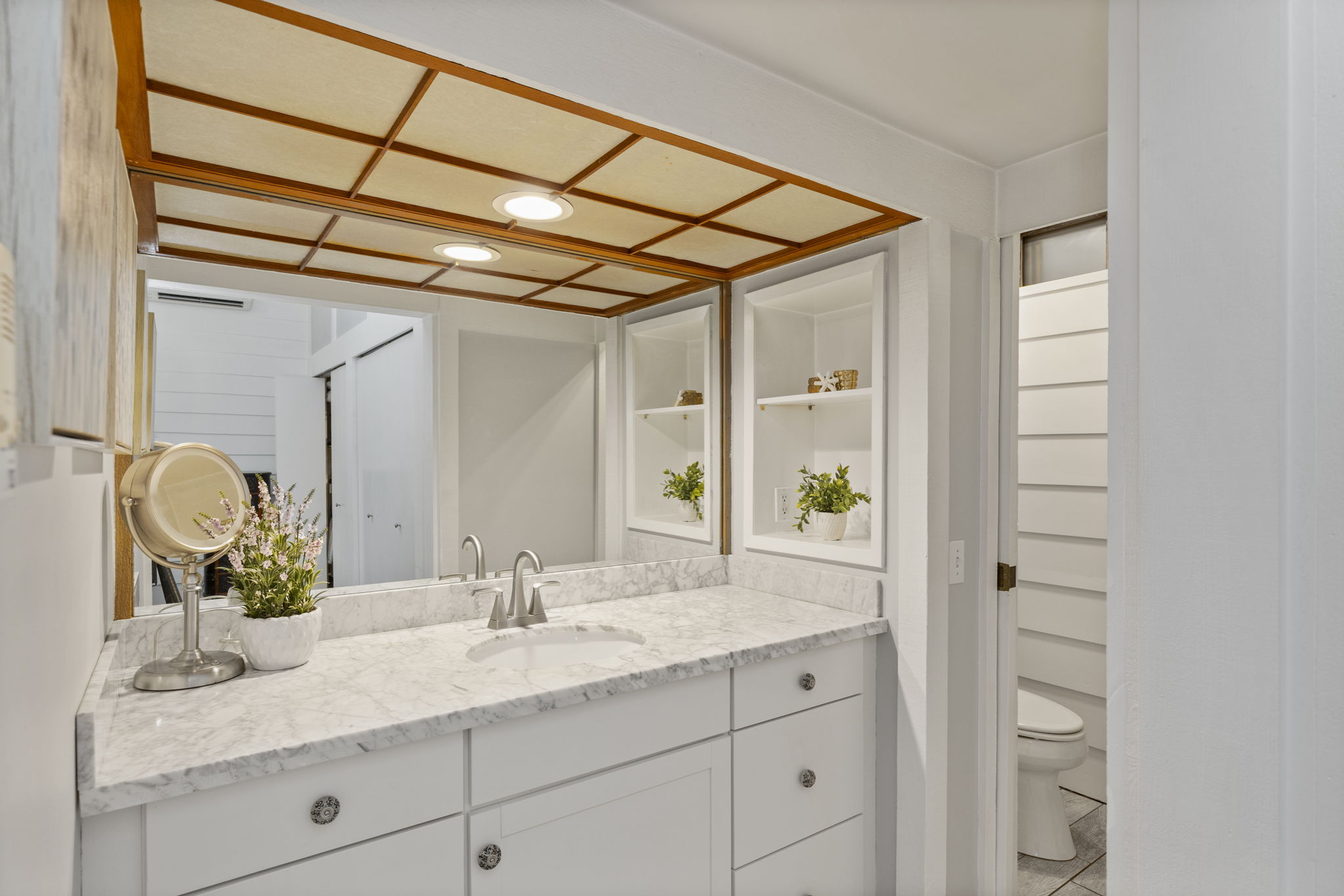 Primary suite features a private ensuite bath
