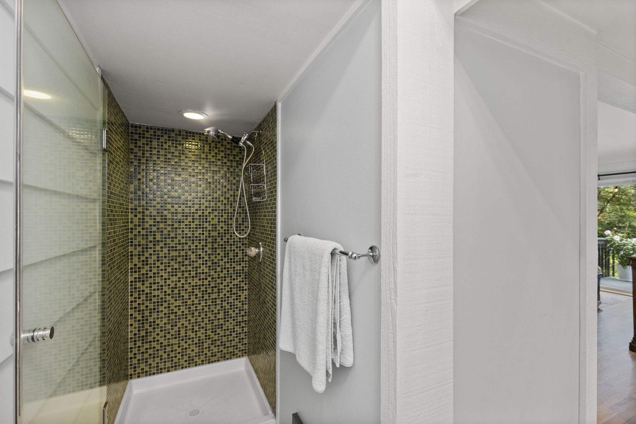 Glass-enclosed shower adds style and function