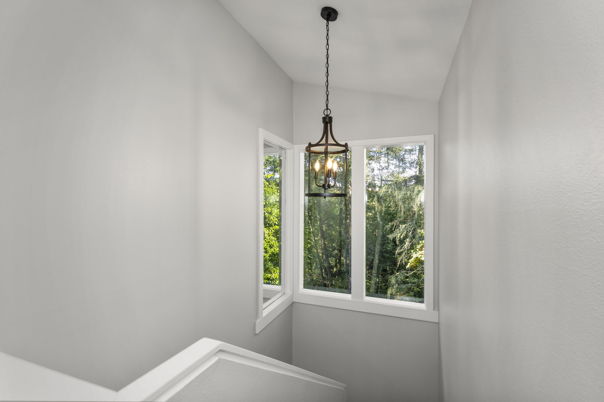 Natural light guides the way to upper level bedroom+flex/office space