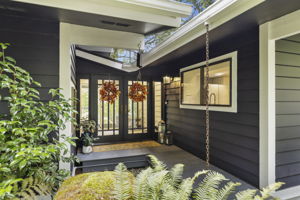 Inviting French doors welcome you home in style