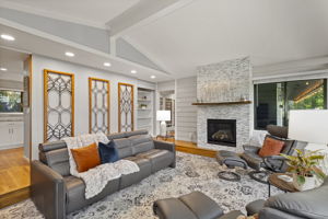 Cozy fireplace adds warmth and charm to the living room