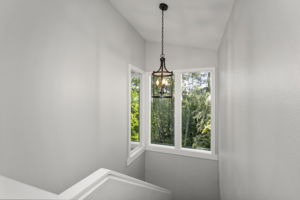 Natural light guides the way to upper level bedroom+flex/office space