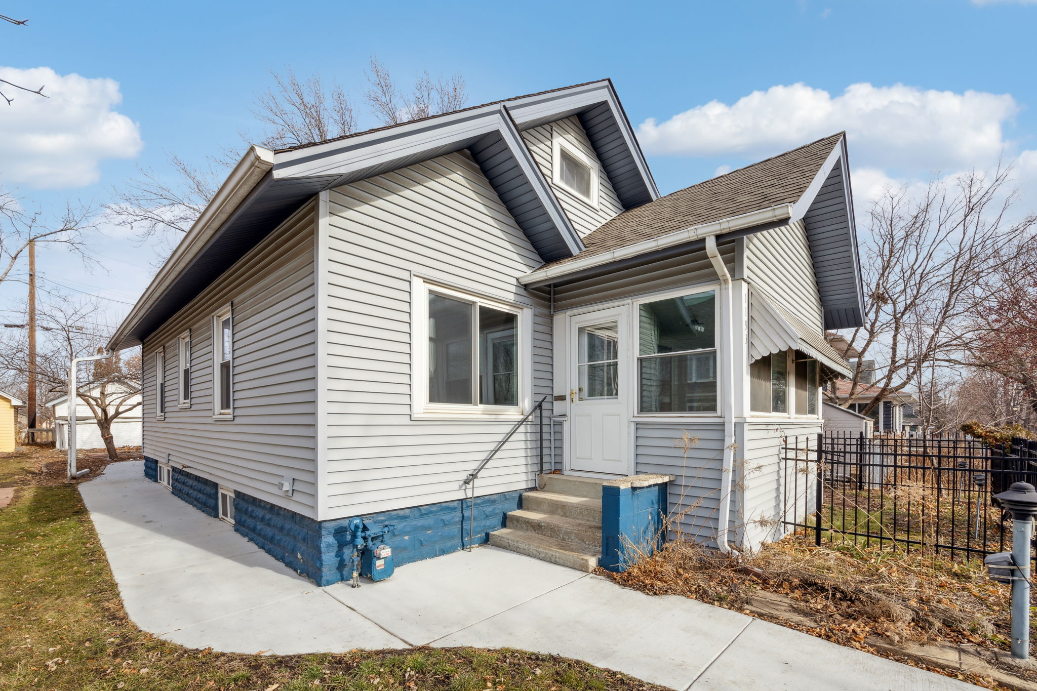 Nice paved walkway that leads all the way to the backyard