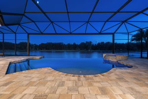 Infinity Edge Pool and Spa with Picture Window Screen-Night
