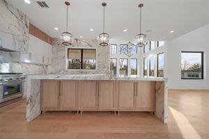2 - Rendering Illustrates Kitchen w_ Finishes Similar to Final Design