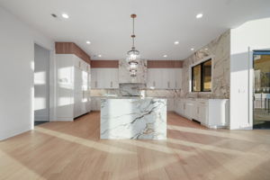 3 - Rendering Illustrates Kitchen w_ Finishes Similar to Final Design