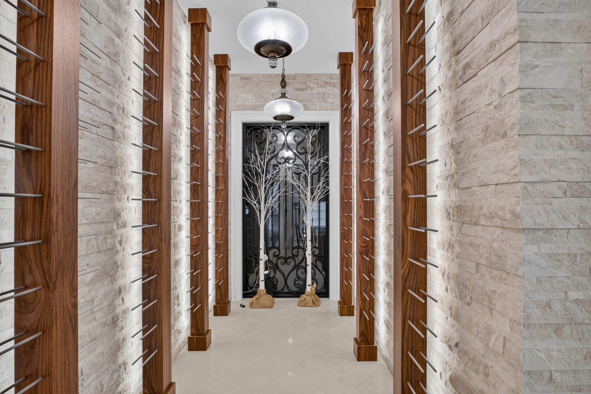 Walnut-and-stone wine displays off the kitchen