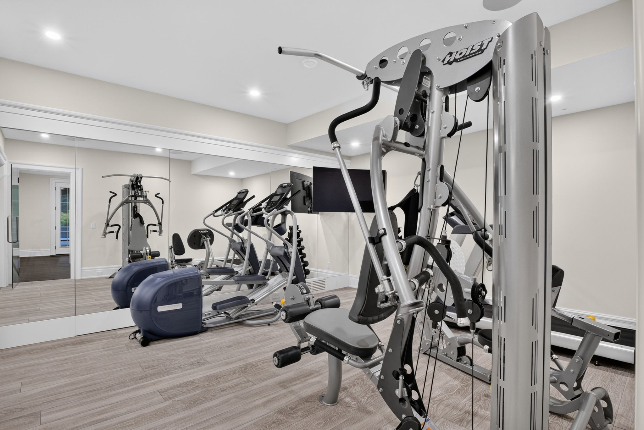 Lower-level gym, with infrared sauna steps away