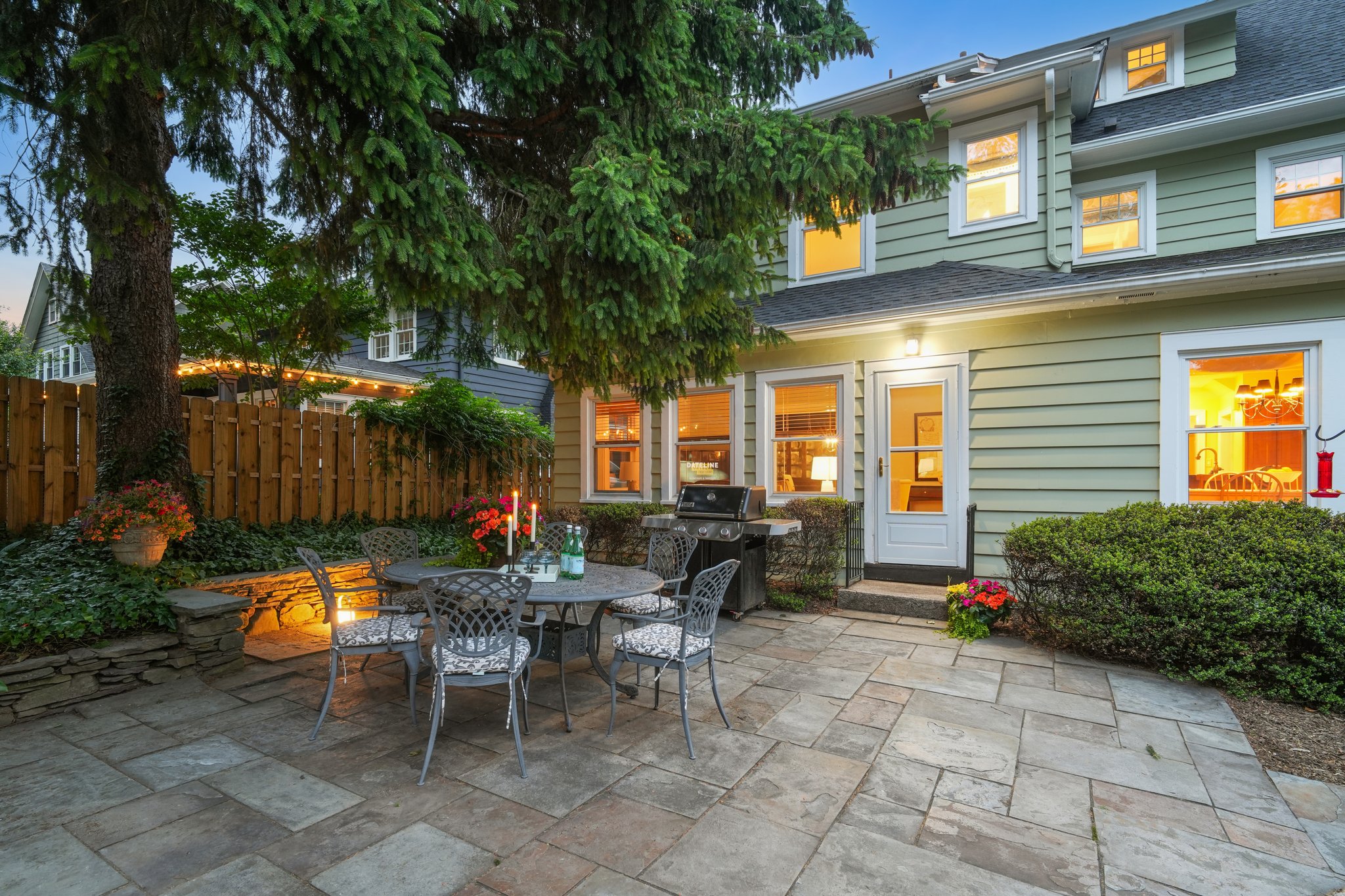 Some of the best moments happen outside.  Dinner under the trees. Fireflies, laughter, and the warm glow from the family room and kitchen windows as evening settles in.  The backyard feels like an extension of the house itself.