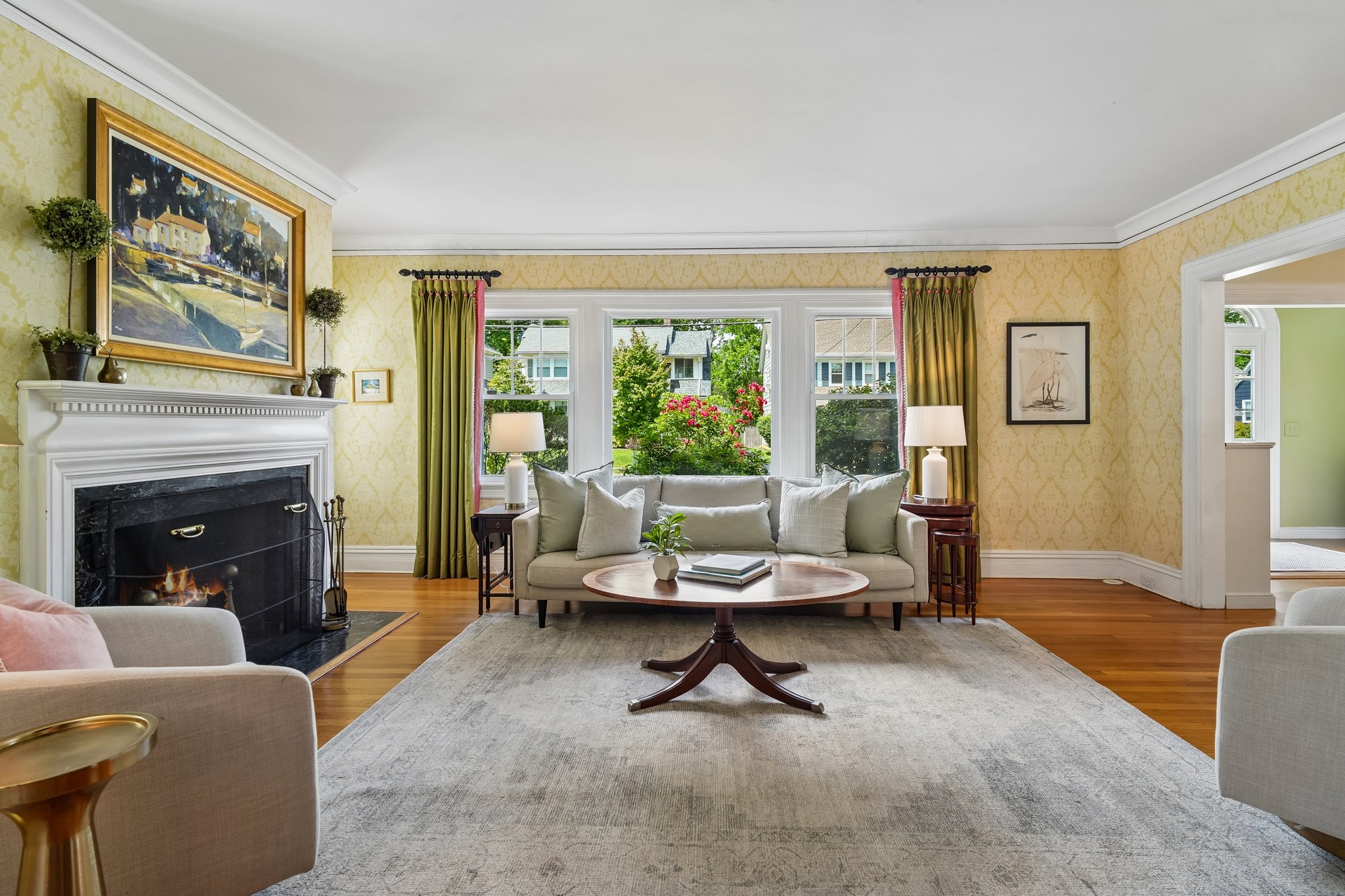 Every spring, the rose outside these windows steals the show. A beloved part of the garden for years, its brilliant blooms create a view that's almost impossible not to stop and admire.