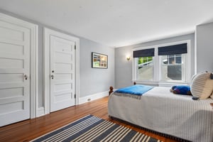 Bedroom 4 on the 3rd floor feels like its own little world. Tucked beneath the roofline, it's the kind of space children dream about and guests never want to leave. Abundant storage space up here too.