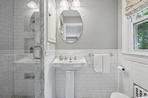 Beautifully updated with timeless finishes, the ensuite bath feels fresh, bright, and quietly luxurious - an everyday convenience that quickly becomes something you can't imagine living without.