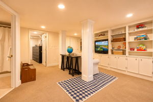 What happens when a lower level lives like its own retreat? A spacious recreation room ready for movie nights, game tournaments, workouts, crafts, or simply spreading out. A bonus room currently welcoming overnight guests. A full bath with shower. Laundry conveniently tucked nearby.