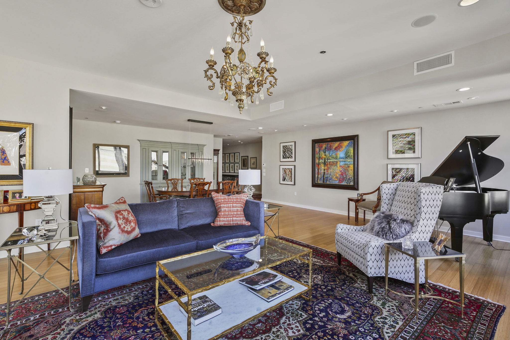 1912 Dining Room + Living Room •	2 – Lighted Custom Built-in Display & Storage Cabinets •	2 – Chandeliers