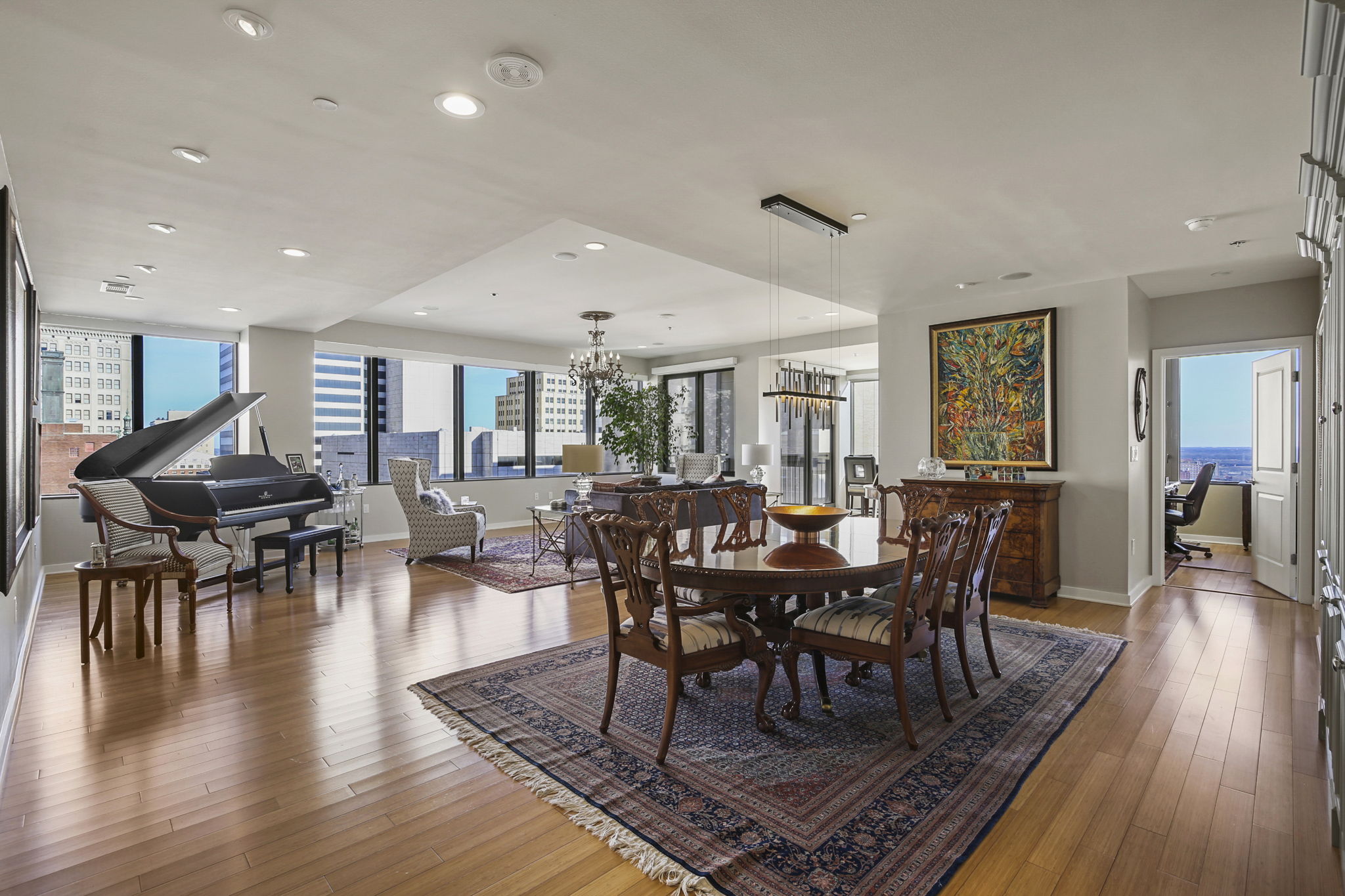 1912 Dining Room + Living Room •	2 – Lighted Custom Built-in Display & Storage Cabinets •	2 – Chandeliers