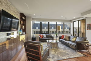1901 Family Room •	Redstone Entertainment Wall Cabinets, floating smoked glass shelves, flat panel Brown Poly Gloss