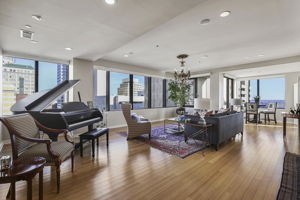 1912 Dining Room + Living Room •	2 – Lighted Custom Built-in Display & Storage Cabinets •	2 – Chandeliers