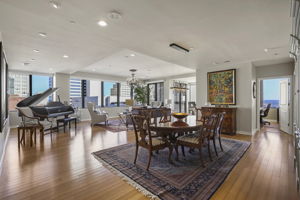 1912 Dining Room + Living Room •	2 – Lighted Custom Built-in Display & Storage Cabinets •	2 – Chandeliers