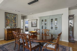 1912 Dining Room • Lighted Custom Built-in Display & Storage Cabinets •	Modern Chandelier