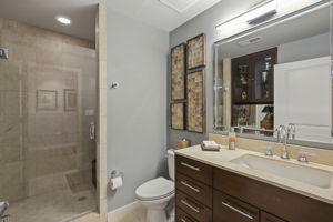 1912 Gallery Hall Bathroom #4: •	American Standard high efficiency toilet (June 2022) •	Kohler vanity sink •	Kohler glass door shower •	Custom Built-in Display & Storage Cabinet