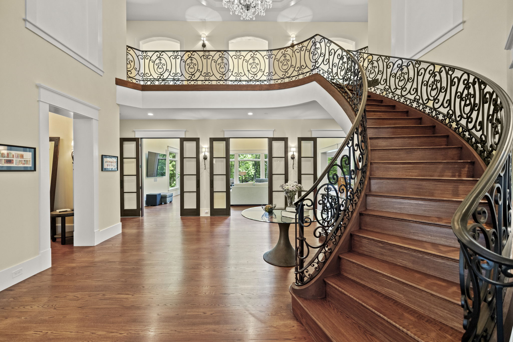 Grand two-story foyer with Iron Staircase