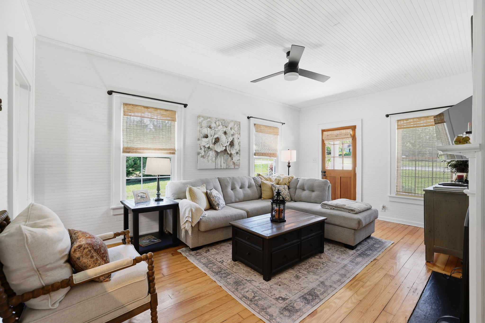 Cozy living room with pine floors