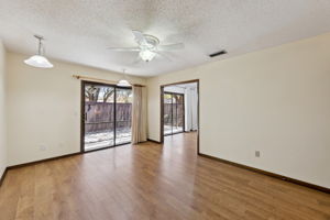 Secondary Bedroom off the dining room with pocket sliders and access to the outdoor patio