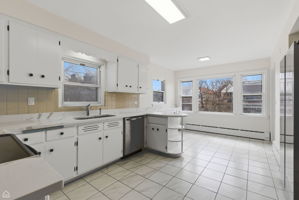 Large eat in kitchen, so sunny and bright!