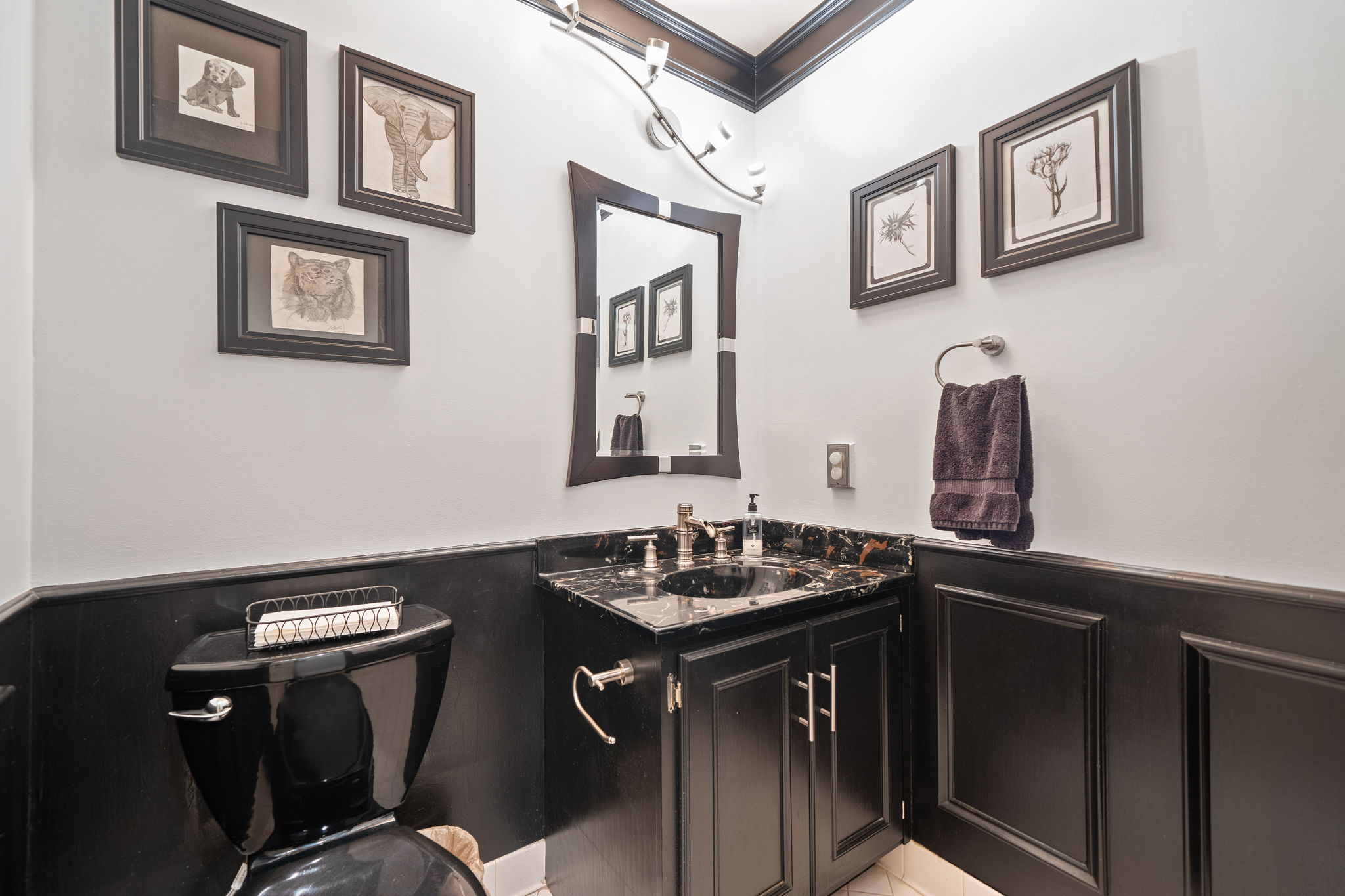 Located down the hall is the Powder Room
